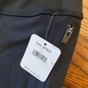 Free people black panel leggings with ankle zip